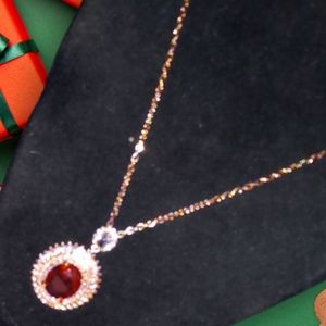 BSK- NWOT LAB CREATED RUBY NECKLACE ON ROSE GOLD CHAIN